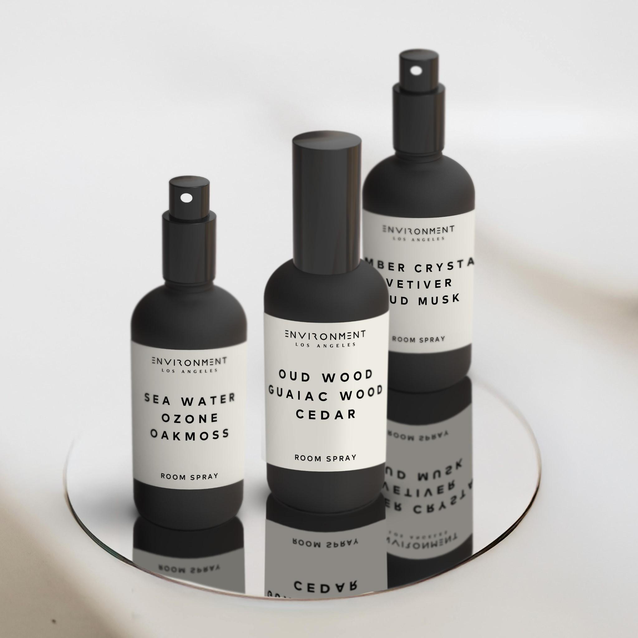 Multiple  Room spray scents on a mirror