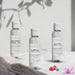 Three distinct fragrance oil bottles