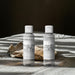 Elegant home fragrance essence displayed with simple packaging and soft decor.
